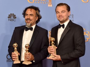 Director Alejandro González Iñárritu, left, and Leonardo DiCaprio will need to sprout some extra hands to hold their Oscar hardware next month. Following their wins at Sunday's Golden Globes, they're shoo-ins for their work in The Revenant.