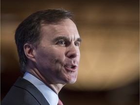 Finance Minister Bill Morneau delivers a speech, Tuesday, January 12, 2016 in Montreal.
