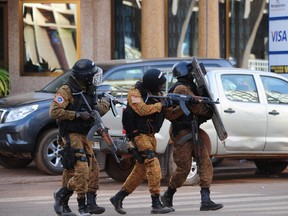 Special police forces are seen during search operations following an attack by Al-Qaeda linked gunmen on January 16, 2016 in Ouagadougou.  Security forces in Burkina Faso on January 16 completed a counter-offensive against jihadist assailants who stormed a top hotel and a restaurant in the capital hours earlier, a security source said.