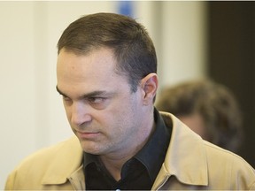 Guy Turcotte walks towards the courtroom at the Saint Jérôme courthouse, Saturday, December 5, 2015.