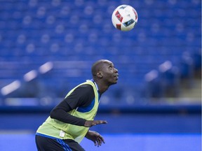 Montreal Impact defender Hassoun Camara heads the ball during first day of training camp Monday, January 25, 2016 in Montreal.