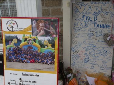 An image of Charlelie Carrier is displayed at makeshift memorial outside his Lac-Beauport home Monday, January 18, 2016, near Quebec City where he lived with family members.