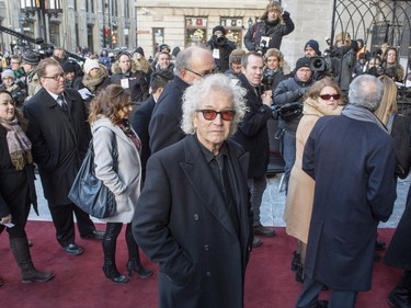 Composer Luc Plamondon arrives for the funeral for René Angélil, late husband of singer Céline Dion, at Notre-Dame Basilica Friday, January 22, 2016 in Montreal. Angélil passed away at the age of 73 after a lengthy battle with throat cancer.