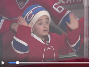 A young Habs fan wishes really hard for a puck of his own.