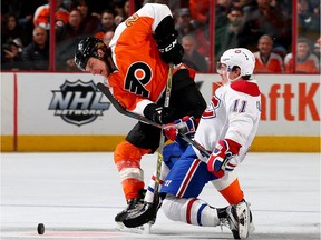 Flyers' Ryan White and Canadiens' Brendan Gallagher collide in the third period at the Wells Fargo Center on January 5, 2016 in Philadelphia.