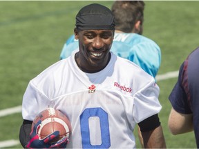 MONTREAL, QUE.: AUGUST 17, 2015 -- Montreal Alouettes running back Stefan Logan has a laugh with a teammate at practice at Parc Hébert de Saint-Léonard in Montreal Monday, August 17, 2015. The team was preparing for their game Thursday against the B.C. Lions. (John Kenney / MONTREAL GAZETTE)