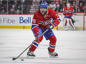 Canadiens defenceman P.K. Subban sticks his tongue out while moving the puck up ice during NHL game against the Washington Capitals at the Bell Centre in Montreal on Dec. 3, 2015.