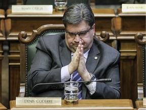 Montreal Mayor Denis Coderre listens to debate during a city council meeting at City Hall in Montreal Monday Dec. 14, 2015.