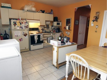 The kitchen and dining area in Myriam Rochet's Verdun apartment. (John Mahoney / MONTREAL GAZETTE)