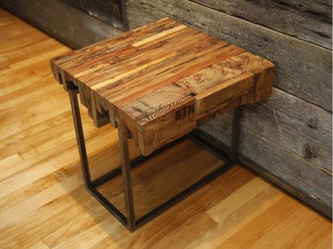 François Xavier Saint Georges and his wife Agnes Dupuis  started their own business - By the North - which repurposes old wood into furniture like this coffee table. (Marie-France Coallier / MONTREAL GAZETTE)