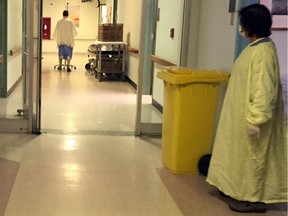 A patient walks down a hall at St Mary's Hospital Centre in Montreal, Dec. 22, 2015.