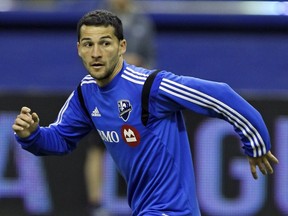 Dilly Duka passes the ball during Montreal Impact practice at the Olympic Stadium in Montreal Friday February 27, 2015