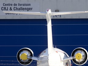 A jet sits outside the delivery center at the Bombardier Aerospace plant in Dorval in 2009.