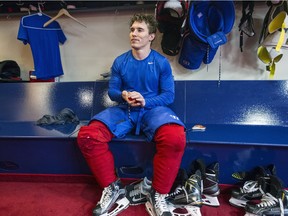 Brendan Gallagher gets undressed after practice at the Canadiens' training facility in Brossard on Jan. 3, 2016.