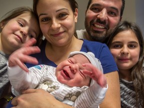 Joanne Rozakis and Pantelis Koukoutsis welcomed their third child, Constantinos Koukoutsis, 7.14 pounds and 50.5 cm long and the first born in Canada at the Jewish General Hospital in Montreal, on Friday, Jan. 1, 2016, at 12:07. Constantinos is the little brother to Melina, 7 years old and Natalia, 9, right.