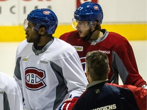 Alex Galchenyuk and teammate Devante Smith-Pelly, left, during practice at the Bell Sports Complex in Brossard, on Tuesday, January 12, 2016.