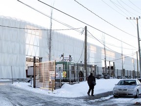Construction workers leave the new Ericsson plant under construction in Vaudreuil-Dorion, Jan. 13, 2016.