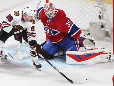 Chicago Blackhawks right wing Patrick Kane (88) tries to go past Montreal Canadiens goalie Mike Condon with puck during first period NHL action in Montreal on Thursday January 14, 2016.