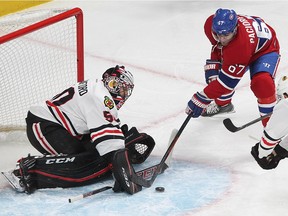 Montreal Canadiens left wing Max Pacioretty (67) gets in close with Chicago Blackhawks goalie Corey Crawford during third period NHL action in Montreal on Thursday January 14, 2016.