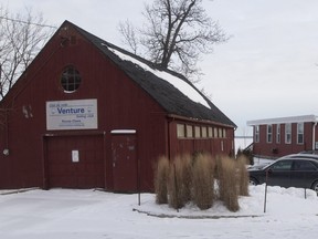 The city of Pointe-Claire's plan would see the Venture Sailing Club's old boat storage building, left, demolished and a pier installed. (Allen McInnis / MONTREAL GAZETTE)