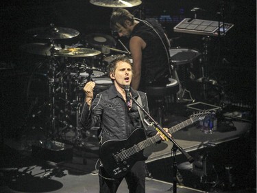 Muse vocalist and guitar player Matt Bellamy and drummer Dominic Howard in concert at the Bell Centre in Montreal Wednesday January 20, 2016.