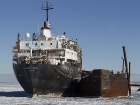 The Kathryn Spirit sits at a dock in Beauharnois west of Montreal, Wednesday Jan. 20, 2016. It has been docked for four years and there are concerns that there are hazardous materials on board which might leak into the St Lawrence River.