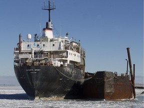 MONTREAL, QUE.: JANUARY 20, 2016 -- The Kathryn Spirit sits at a dock in Beauharnois west of Montreal, Wednesday January 20, 2016. It has been docked for 4 years and there are concerns that there are hazardous materials on board which might leak into the St Lawrence River.  ( Phil Carpenter / MONTREAL GAZETTE)