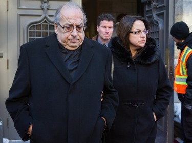 André Angélil, left, brother of René Angélil, leaves the visitation of René Angélil, husband and manager of Céline Dion, on Thursday January 21, 2016 at the Notre Dame Basilica in Montreal. Angélil died of cancer January 14, 2016 and will be lying in state until his funeral Friday, January 22.