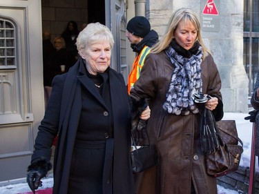 Denise, left, sister of Céline Dion's mother Thérèse Dion, leaves the visitation of René Angélil, husband and manager of Céline Dion, on Thursday January 21, 2016 at the Notre Dame Basilica in Montreal. Angélil died of cancer January 14, 2016 and will be lying in state until his funeral Friday, January 22.