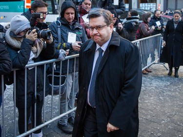 Montreal Mayor Denis Coderre arrives to pay his respects to René Angélil, pop star Céline Dion's husband and manager, on Thursday January 21, 2016 at the Notre Dame Basilica in Montreal. Angélil died of cancer January 14, 2016 and will be lying in state until his funeral Friday, January 22.
