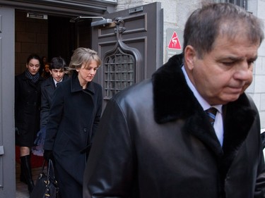 Mourners leave the visitation of René Angélil, husband and manager of Céline Dion, on Thursday January 21, 2016 at the Notre Dame Basilica in Montreal. Angélil died of cancer January 14, 2016 and will be lying in state until his funeral Friday, January 22.