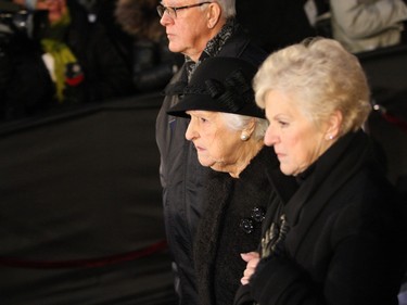 Celine Dion's mother, Thérèse Dion leaves Notre-Dame Basilica with members of her family during René Angelil's funeral on January 22, 2016.