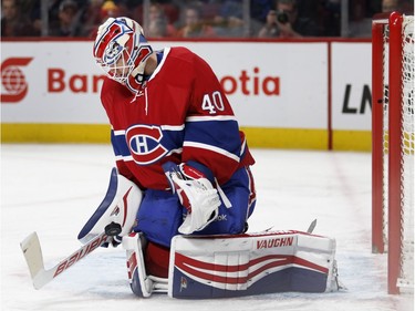 Montreal Canadiens goalie Ben Scrivens makes a save against the Columbus Blue Jackets during NHL action at the Bell Centre in Montreal on Tuesday January 26, 2016.