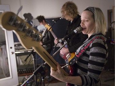 Robbie MacArthur, left, Jace Lasek and Olga Goreas of the Besnard Lakes rehearse at Breakglass Studios in Montreal on Monday, January 4, 2016.