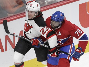 Defenseman P.K. Subban of the Montreal Canadiens holds up Bobby Farnham of the New Jersey Devils in the second period at the Bell Centre in Montreal on Wednesday, Jan. 6, 2016.