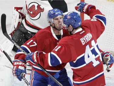 Forward Torrey Mitchell of the Montreal Canadiens celebrates his short-handed goal against Cory Schneider of the New Jersey Devils in the second period with teammate Paul Byron during an N.H.L. game at the Bell Centre in Montreal Wednesday, January 6, 2016.