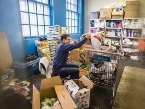 At the Sun Youth food bank in Montreal, vegetable food bags are prepared. Food banks rely on cash donations to buy vegetables.