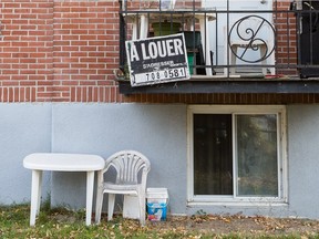 A balcony with a For Rent sign on an apartment building on Barclay avenue in the borough of Côte-des-Neiges in Montreal on Saturday, November 8, 2014. Rent prices in the borough are higher than elsewhere in Montreal and the average income of tenants is lower.
