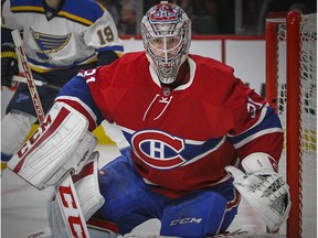Carey Price follows the puck during second period of National Hockey League game against the St. Louis Blues in Montreal Tuesday October 20, 2015.