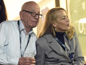This file photo taken on October 31, 2015 shows Australian-born media magnate Rupert Murdoch and former model Jerry Hall watching the action during the final match of the 2015 Rugby World Cup between New Zealand and Australia at Twickenham stadium in southwest London.