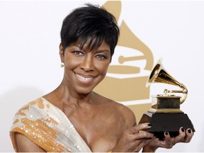 In a Feb. 8, 2009, file photo, Natalie Cole holds the best instrumental arrangement accompanying vocalist award backstage at the 51st Annual Grammy Awards, in Los Angeles. Cole, the daughter of jazz legend Nat "King" Cole who carried on his musical legacy, died Thursday night, Dec. 31, 2015, according to publicist Maureen O'Connor. She was 65.