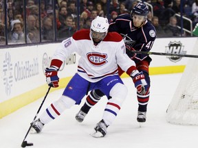 Montreal Canadiens' P.K. Subban, left, works against Columbus Blue Jackets' Alexander Wennberg, of Sweden, during the second period of an NHL hockey game in Columbus, Ohio, Monday, Jan. 25, 2016.