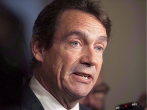 Quebec Opposition Leader Pierre Karl Péladeau reacts to the election of a federal Liberal majority government at the Quebec National Assembly on October 20, 2015. Peladeau has denied a report Quebecor Inc. was actively involved in tax havens abroad when he was president of the conglomerate.