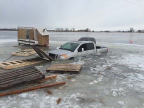 Two vehicles broke through the ice in Pointe aux Trembles Jan. 28, 2016. No one was injured.