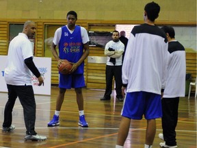Raptors' Bruno Caboclo, centre with ball, takes part in Basketball Without Borders Global Camp in 2013 before he was drafted into the National Basketball Association. He will be among NBA players and coaches giving hands-on training to teenagers at this year's camp during 2016 NBA All-Star Game activities in Toronto.