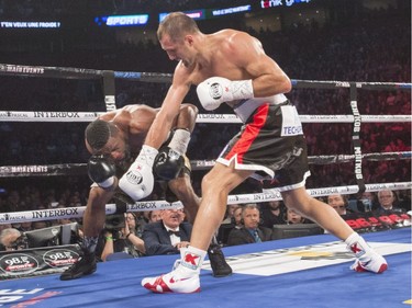 Sergey Kovalev, right, from Russia, lands a right to the head of Jean Pascal, from Laval in their light-heavyweight world championship fight Saturday, January 30, 2016, at the Bell Centre.