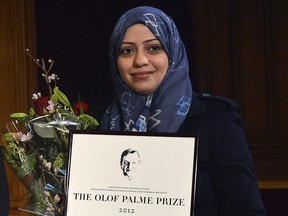 Samar Badawi, the sister of jailed blogger Raif Badawi, receives the Olof Palme Prize 2013 at the Swedish Parliament in Stockholm on Jan. 25, 2013.