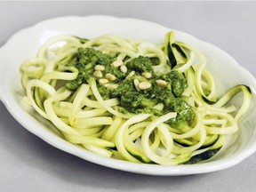 Zucchinini "spaghetti" with pesto: a spiralizer can turn vegetables into a substitute for starchy pasta.