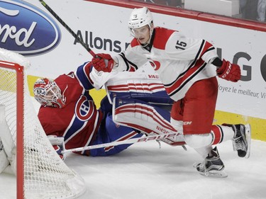 Andrej Nestrasil of the Carolina Hurricanes skates away after knocking down Montreal Canadiens Ben Scrivens in the first period at the Bell Centre on Sunday, Feb. 7, 2016.