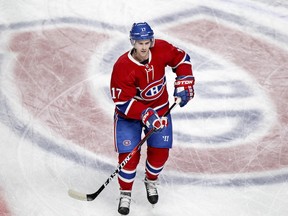 Torrey Mitchell skates past the team's logo prior to  game against the Nashville Predators on Monday, Feb. 22, 2016. (John Mahoney / MONTREAL GAZETTE)